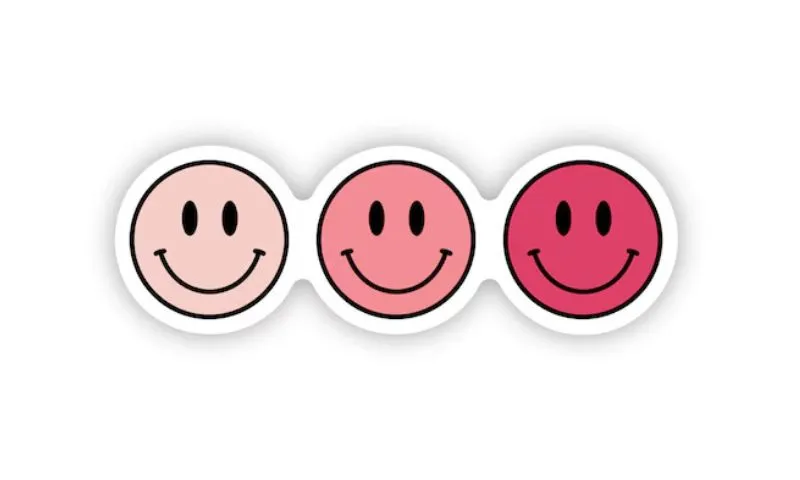 hình ảnh sticker mặt cười tông hồng và màu vàng mắt hình trái tim